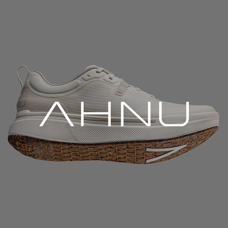 Ahnu logo and white shoe