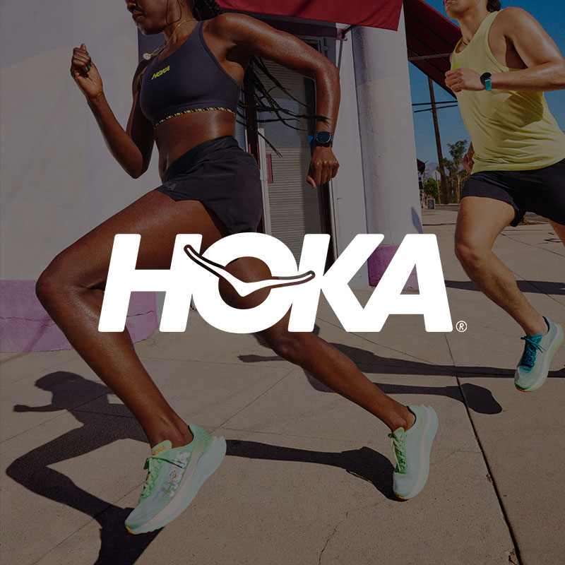 Hoka logo and two people running